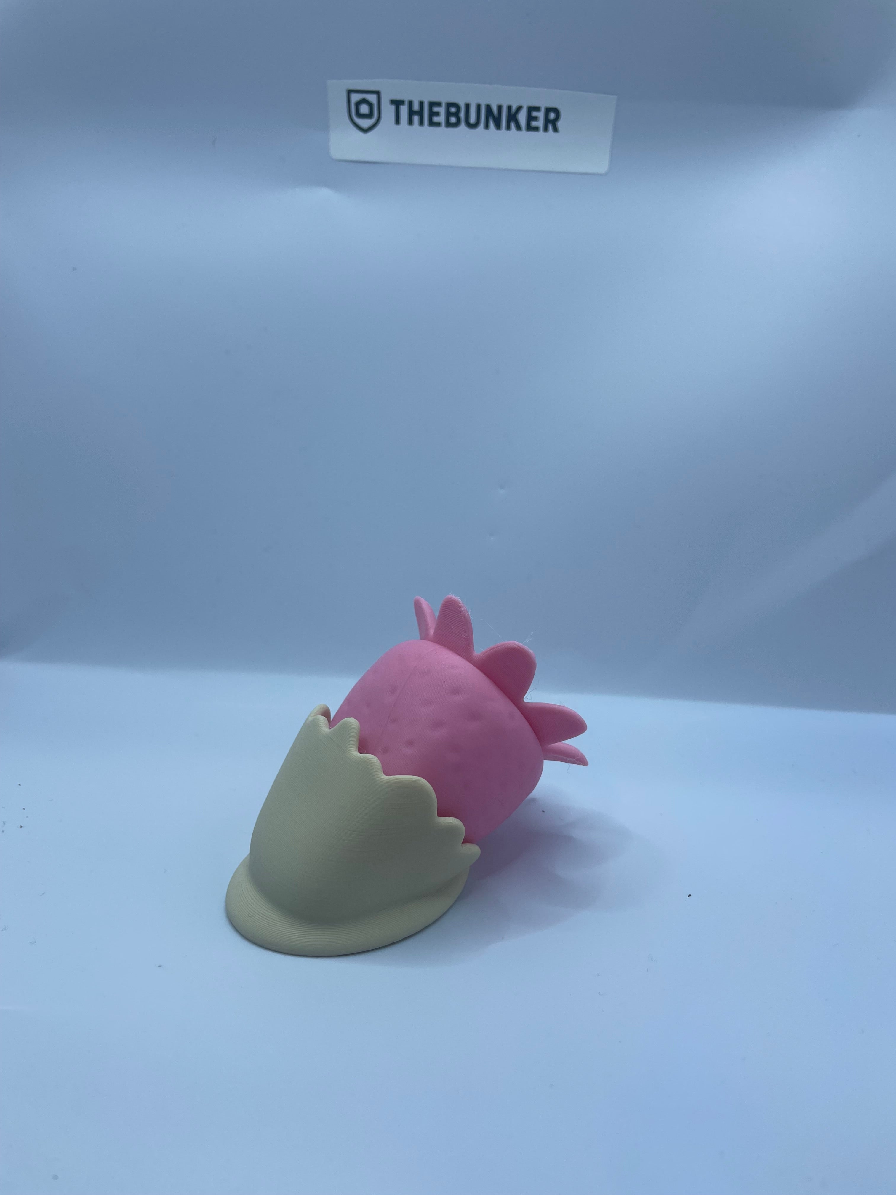 White and pink clicky strawberry